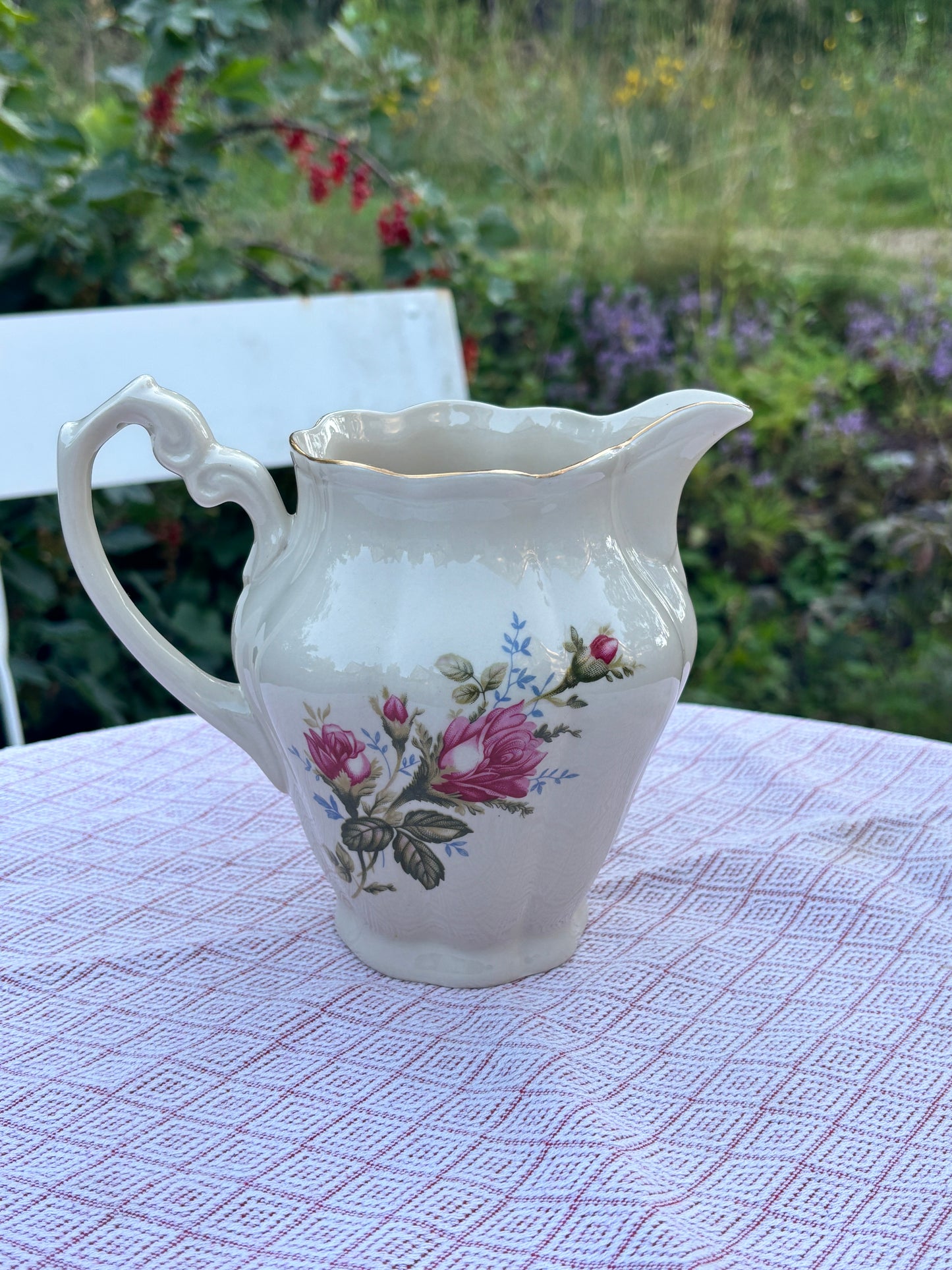 Vintagemugge med blomstermotiv
