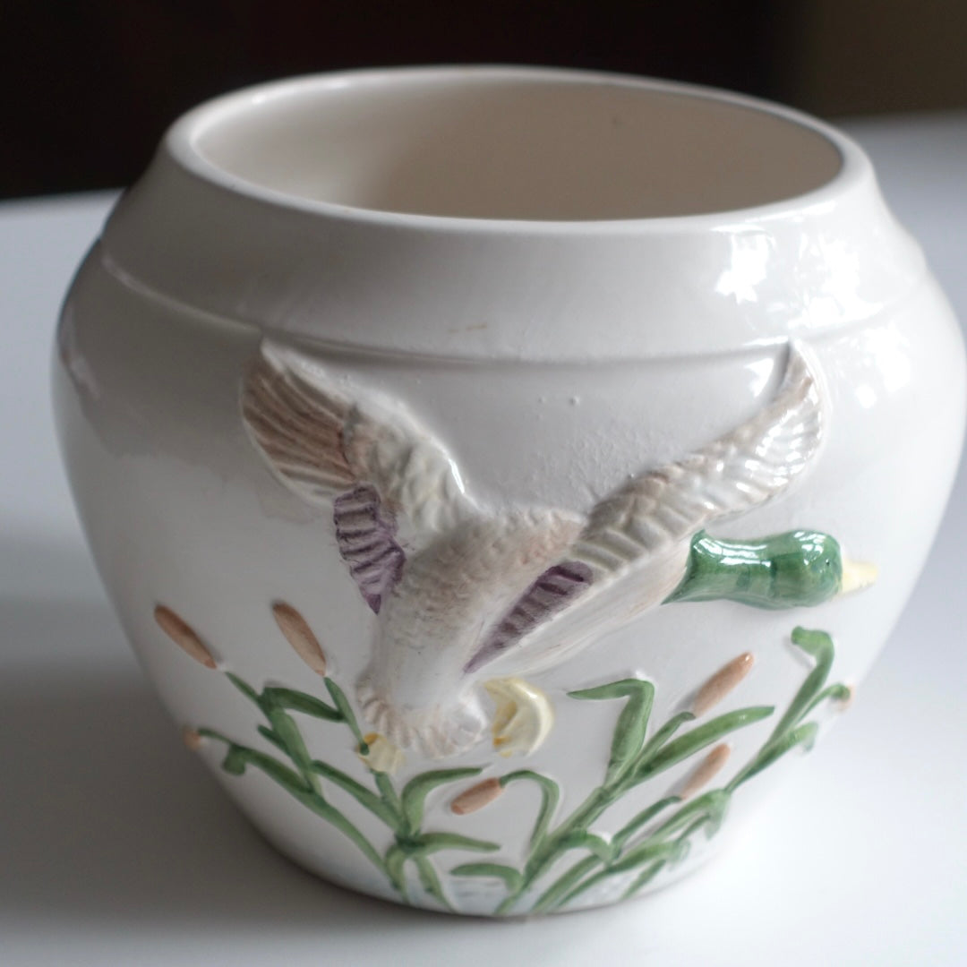 Vintage potteskjuler med blomsterdekor
