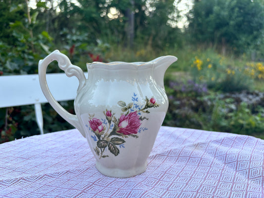 Vintagemugge med blomstermotiv