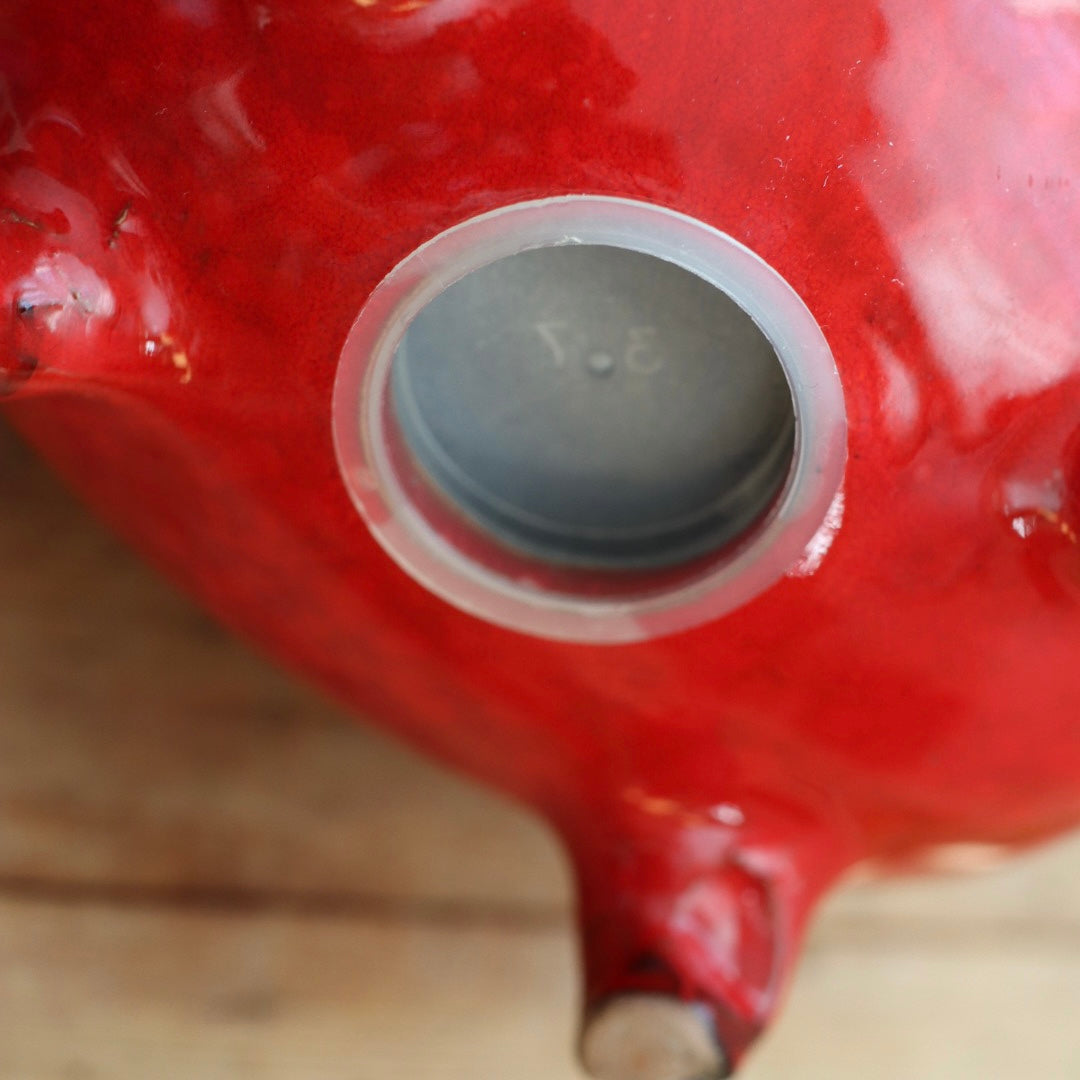 Vintage sparegris i rød keramikk