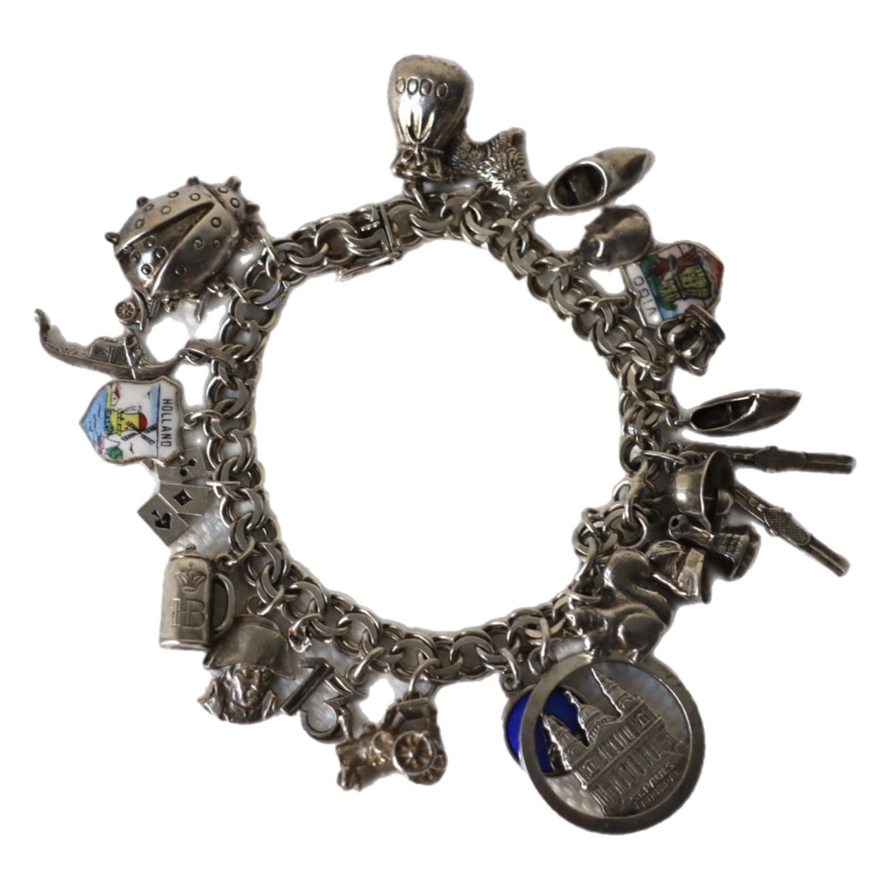 Vintage armbånd i sølv med charms
